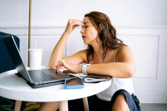 A lady working struggling to focus