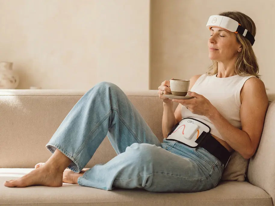 Women Meditating using a red light system 